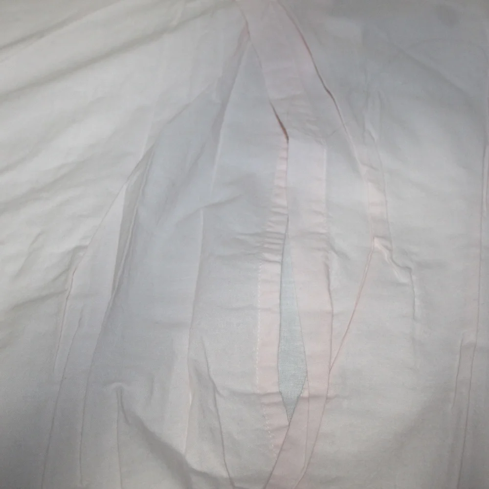 Williams Sonoma 100% Cotton Sheeting with raw edge wave pattern.  Hand Quilting